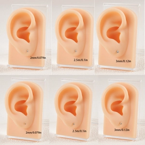 Size comparison of 2mm, 2.5mm and 3mm round cubic zirconia stud earrings on ear models