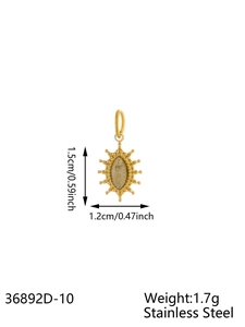 Detailed view of a gold vintage pendant with dimensions 1.5cm by 1.2cm and light brown stone