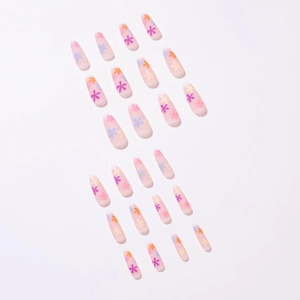 Pastel rainbow floral press-on nails in long coffin shape on transparent base