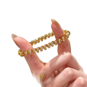 18K gold plated twisted spring bracelet with white cubic zirconia for a luxury look
