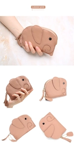 Detail view of lobster pink leather elephant coin purse with lychee grain texture