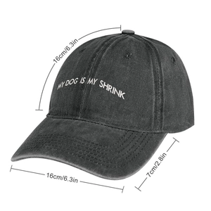 Detail of My Dog Is My Shrink white embroidery on a black washed cotton baseball cap