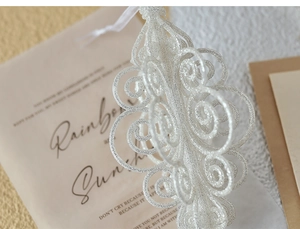 Close-up of elegant champagne glitter snowflake ornament with intricate filigree texture
