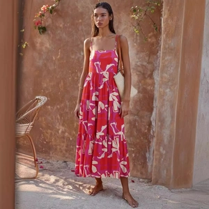 Floral A-line maxi sun dress with spaghetti straps and tiered skirt for summer vacation