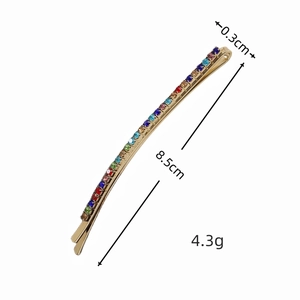 Colorful rhinestone hair clip in gold finish with 8.5cm length dimensions