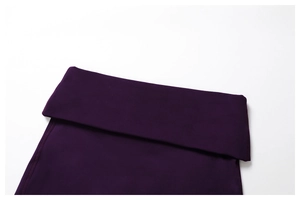 Detail view of high-waist yoga pants with wide waistband and double-needle stitching