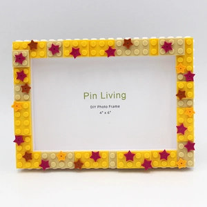 DIY 4x6 building block photo frame in yellow and beige with colorful star decorations