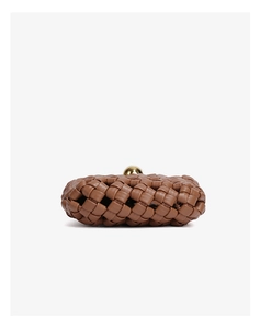 Detail view of brown woven leather mini crossbody bag with golden spherical metal clasp