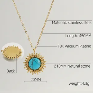 Detailed close-up of sunburst gold pendant with inlaid turquoise on 18K plated chain