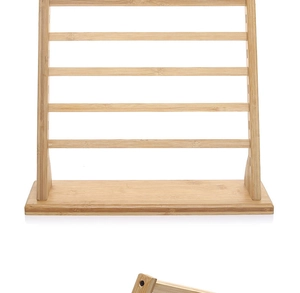 Detail of multi-tier bamboo jewelry stand with six horizontal bars and thick wood base