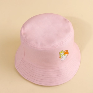 Detail view of pink cotton bucket hat with cute frog and mushroom embroidery