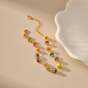 Detail of colorful faceted beads on 18K gold plated chain with lobster clasp and extender