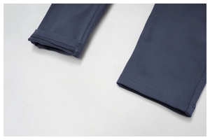 Close-up of flat-lock stitching and high-elastic fabric on yoga bodysuit leg cuffs