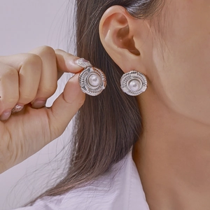 British style geometric pearl stud earrings in silver finish with woven metal border