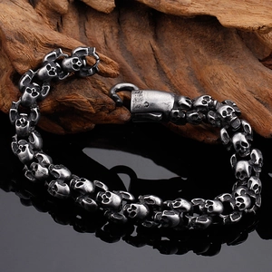 Close-up of vintage punk skull bracelet in silver-tone stainless steel with clasp