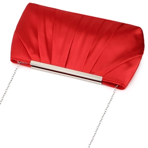 Detail view of red pleated satin clutch with silver metal frame and elegant chain strap