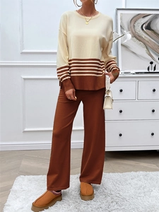Detail of knit stripe sweater and wide leg pants set in beige and brown colors