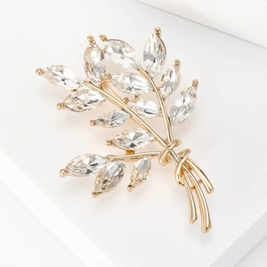 Elegant wheat ear brooch with sparkling marquise crystals on a gold-plated alloy base