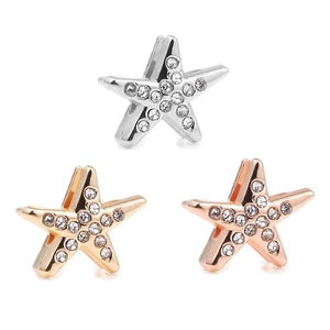 Starfish charms with sparkling rhinestones in silver, gold, and rose gold finishes
