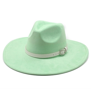 Detail of mint green suede fedora featuring a 9cm wide brim and white belted strap