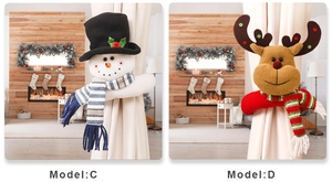 Detailed view of Christmas snowman and reindeer curtain buckles in festive home setting