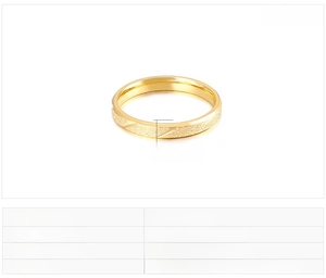 Detail view of 3mm wide matte frosted stainless steel ring with elegant golden finish
