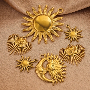 Selection of golden stainless steel sun and heart charms for DIY jewelry making