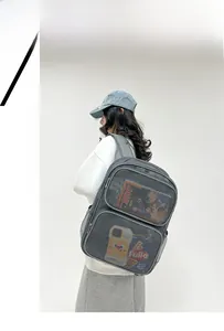 Close-up of breathable mesh backpack showing double-layer texture and dual storage compartments