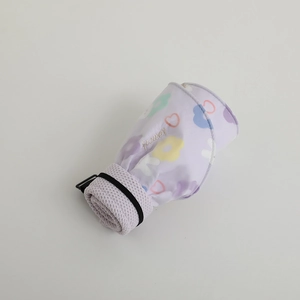 Close-up of light purple floral fabric sun hat with flower embroidery and adjustable strap