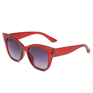 Retro oversized cat eye sunglasses with red transparent frames and purple gradient lenses