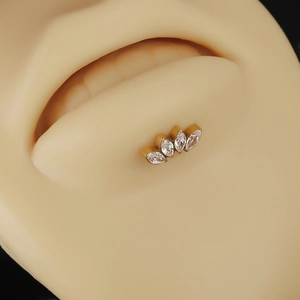 F136 Titanium gold leaf labret stud with marquise zircon stones on model's lip