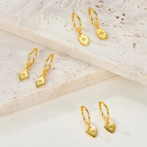Elegant gold S925 sterling silver geometric earrings with star-shaped zircons on stone