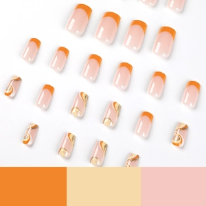 Orange French press-on nails with wave patterns and golden glitter in almond shape