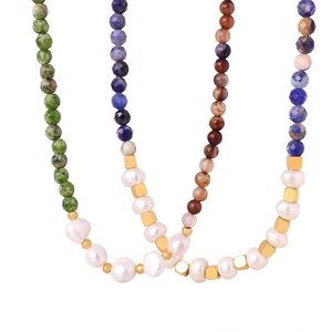 Ethnic style necklace with natural stones and freshwater pearls in vibrant colors