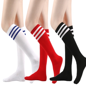 Three pairs of white knee-high socks with blue, red, and black stripes in soft cotton knit
