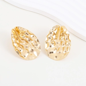 Chic golden metal water drop earrings with unique hammered texture on white background