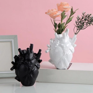 Creative anatomical heart shaped vases in black and white for Halloween decor