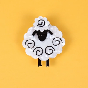 Cartoon sheep acrylic hair clip in white and black with whimsical swirl wool pattern