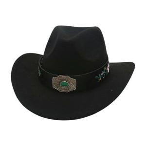 Close-up of black felt cowboy hat with green gemstone buckle and floral embroidery