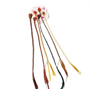 Set of 6 colorful braided hair extensions for girls on white card with floral design