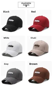 Detail view of distressed baseball caps with embroidered patches in six various colors