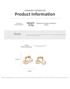 Detailed view of copper horse earrings with faux pearl pendants measuring 2.5cm by 1.5cm
