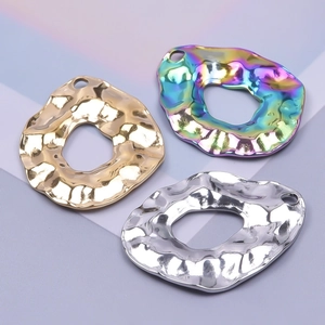 Irregular geometric stainless steel pendants with hammered texture in gold, silver, and rainbow