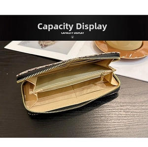 Interior of women's long wallet showing multi-card slots and zippered coin compartment