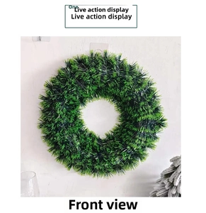 Front view of a 42cm green tinsel Christmas wreath for holiday wall decoration.
