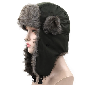 Detail view of winter trapper hat with gray faux fur lining and chin buckle strap