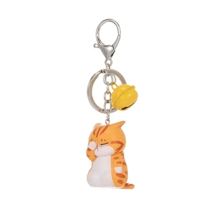 Cute orange tabby cat keychain with a yellow bell and silver lobster clasp on white background