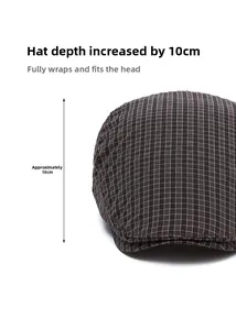 Detail of dark plaid flat cap showing 10cm depth design for full head coverage
