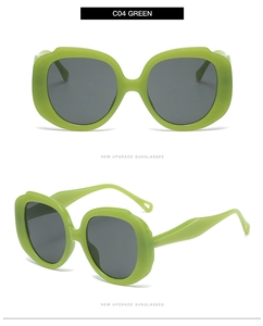 Detail view of round green frames and black lenses on trendy oversized sunglasses