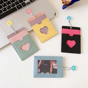 Chic multi-color faux leather card holder with heart cutout and floral pendant charm